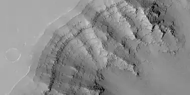 Close view of layers in the Louros Valles, as seen by HiRISE under HiWish program; this is an enlargement of a previous image.