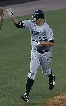 Josh Johnson giving a high-five while walking