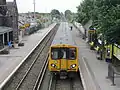 A Merseyrail Class 508 at the station, with a service to Liverpool Central.