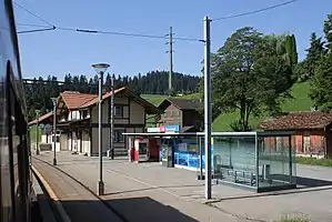 Two-story building with gabled roof