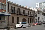 The building formerly known as Granite Lodge and the extension (for the two structures to form the St. George's Orphanage for Girls), now used as the Head Office of the SAHRA. Granite Lodge, a predominantly Georgian granite-fronted house was built c. 1834 for Anthony Oliphant, the first Attorney-General of the Cape Colony. Otto Landsberg, the famous artist and tobacconist, lived here from 1845 to 1865. Current use: Offices.