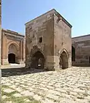 The main courtyard with the elevated mosque