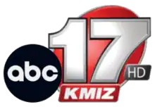 The ABC network logo next to a silver 17 with black trim on a red oval. Beneath the base of the 17 is a red parallelogram with white letters K M I Z. Nestled in the lower right corner near the 7 is a gray parallelogram with silver letters "HD".