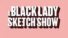 This is the title card for A Black Lady Sketch Show. The type is large and sans serif and the font color is white; the background is light pink and each letter has a drop shadow.