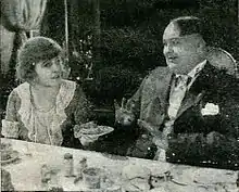 Milly, a cabaret dancer, offers Tim her pie at a theatrical boarding house