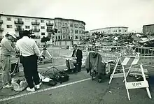 Image 40A journalist works on location at the Loma Prieta Earthquake in San Francisco's Marina District October 1989. (from Broadcast journalism)