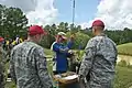 A member of Team USA loading his blackpowder rifle