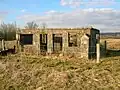 A ruin within the Nettlehirst grounds bearing an 1811 marriage stone