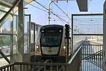 A train of Zhengzhou Metro Chengjiao line approaching the station