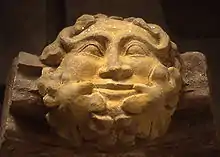 This stone carving of a Green Man from Dore Abbey, Herefordshire, England, retains some of its original colouring.