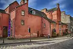 21 Maygate And Abbot Street, Abbot House, Including Gateways And Decorative Ironwork To East And West