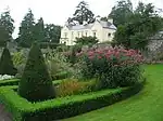 a walled garden overlooked by a house