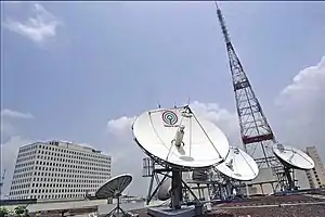 The ABS-CBN Broadcasting Center as viewed from the rooftop of the main building of ABS-CBN. ELJ Communications Center (left) and Millennium Transmitter (right).