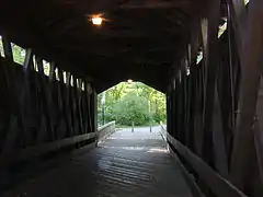 Inside, showing Brown truss stringers.