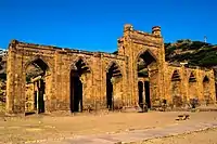 Screen of the Adhai Din Ka Jhonpra mosque (c. 1229), Ajmer, India; Corbel arches, some cusped.