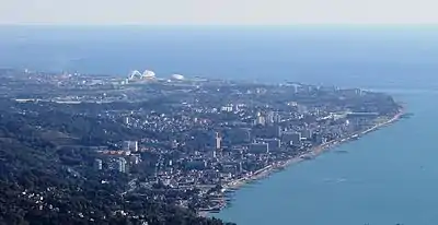 The coastal resort of Adler as seen from the Mount Akhun, 9 kilometres (5.6 mi) to the northwest