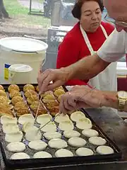 Danish æbleskiver being prepared