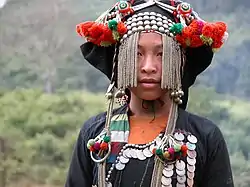 Image 27Akha girl in traditional dress (from Culture of Laos)