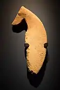 The head and body of a Saluki is made of stone from the Al-Magar civilization, in the Neolithic period, (about 8000 BC).