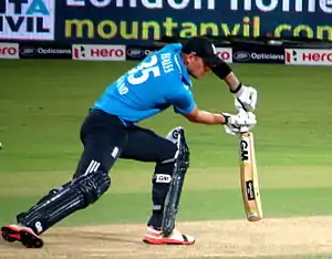 A man playing a shot wearing England ODI jersey