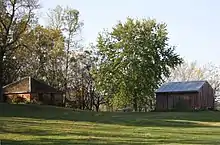 Barn (right) and icehouse (left)