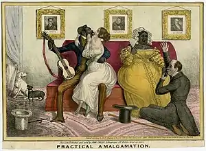 Anti-miscegenation cartoon promoting anti-abolitionists' fears of racial and sexual integration. Depicts a parlor scene where two inter-racial couples court on a couch. On the left, an attractive white women sits on the lap of a vigorous African American man. The man, depicted with grotesque facial features, holds a guitar in his free hand as she engages him in a kiss. On the right, a large African American woman is wooed by a dainty white man on his knees who holds her hand. Portraits of abolitionists Arthur Tappan, Daniel O'Connell (a radical Irish abolitionist), and John Quincy Adams hang on the wall above the couch. A white and black dog "court" in the corner.