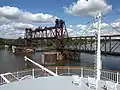 American Queen docked in Ottawa, Illinois facing the Ottawa Rail Bridge in September 2018. She cannot proceed up the Illinois River beyond this point.