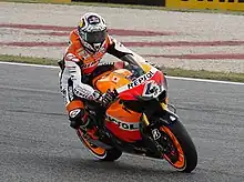 Andrea Dovizioso riding his Repsol Honda RC212V at the 2011 Portuguese Grand Prix.