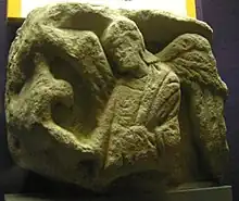 Worn relief of an angel from St Mary's Church, Reculver in Kent