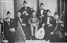 The brothers with Yusuf Za'arur and their group in Baghdad in 1935.