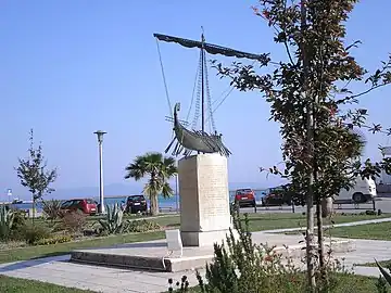 Modern sculpture of Argo, the mythic ship of the Argonauts, at the port