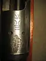 Inscriptions found on top part of receiver of a Japanese Arisaka Type 38 rifle (the "Imperial Chrysanthemum" is ground out)