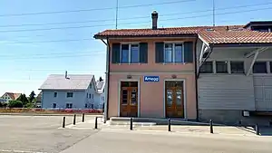 Two-story building with gabled roof