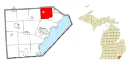 Location within Monroe County (red) and the administered village of Carleton (pink)