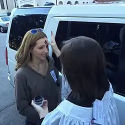 A woman receives a cross of ashes on Ash Wednesday outside an Episcopal church, 2015