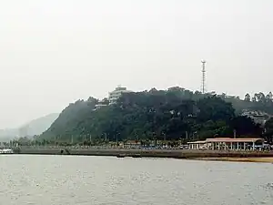 The old ferry terminal, on the hill is the Hải Quân Hotel and the villa of General Võ Nguyên Giáp