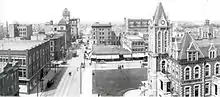 Looking west down 11th Avenue past the old Regina City Hall to the old post office, 1912.