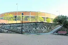 Exterior wall. Bullring in the background