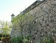 Strong curtain wall to the east with bartizan in the background