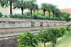 Continuation curtain wall of the Bastion of San Vicente with upper embrasures