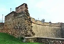 Junction of concave defensive wall with old defensive wall