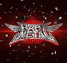 The Babymetal logo, set over a red circle on a darker red background, surrounded by an explosion of silver particles