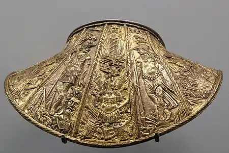 A dosseret or back plate for protecting the back of the neck, with figures of Mars and Minerva (end of 16th century)