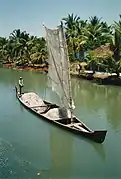 Traditional merchant boat on the backwaters (Kerala)