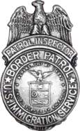 Badge of the United States Border Patrol, circa 1939.