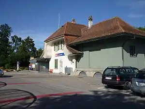 Three-story building with hip roof