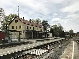 Two-story building with gabled roof