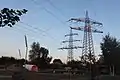 Crossing of single phase AC powerline Mannheim-Neckarelz ( tower on the right) with single phase AC powerline Mannheim-Wiesental ( tower on the left)