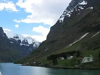 View of the church on the shore of the Nærøyfjorden