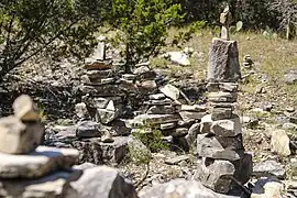 Stacks of Edwards Limestone pieces put up by hikers, near Warbler Vista